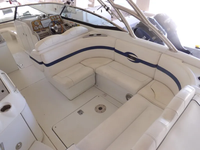 Slide: The Image of 2008 Formula 310 Bowrider interior with white and blue seating. - 9