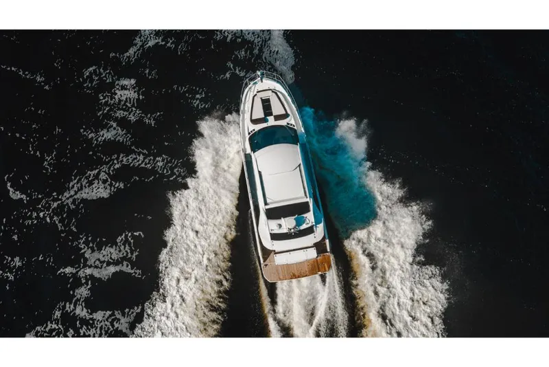 Slide: The Image of Aerial view of 2023 Galeon 410 HTC yacht cruising on open water. - 17
