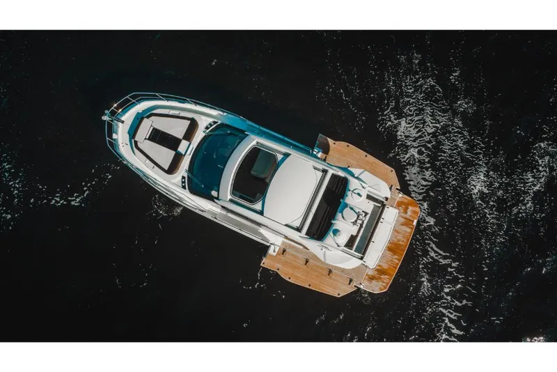 Slide: The Image of Aerial view of 2023 Galeon 410 HTC luxury yacht on water. - 27