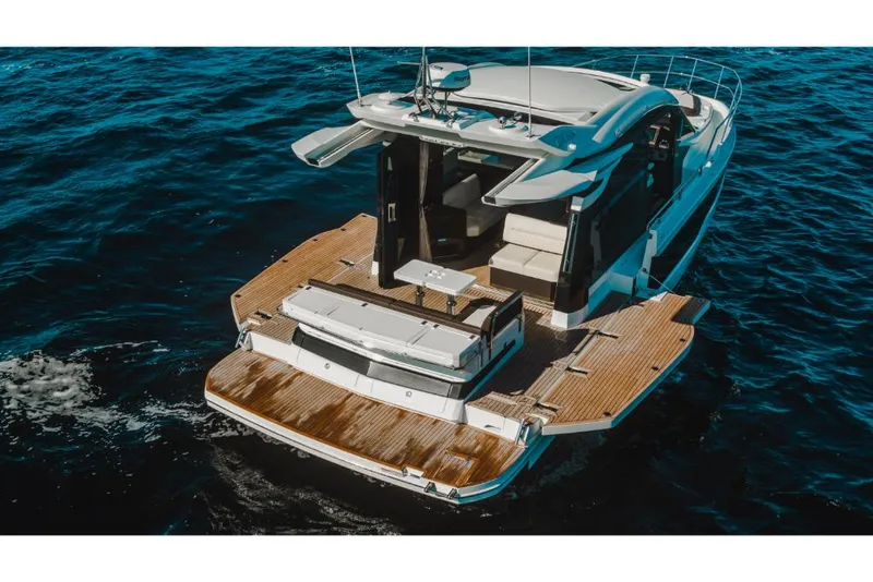 Slide: The Image of 2023 Galeon 410 HTC luxury yacht on open water. - 29