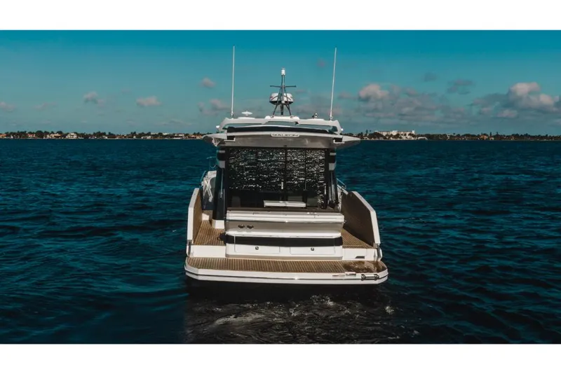 Slide: The Image of 2023 Galeon 410 HTC yacht on open water. - 3
