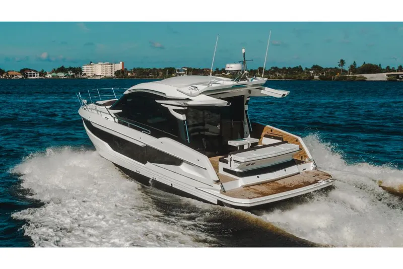 Slide: The Image of 2023 Galeon 410 HTC luxury yacht cruising on open water. - 41