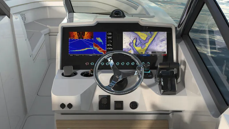 Slide: The Image of 2023 Bertram 28XC boat dashboard with navigation screens and steering wheel. - 10