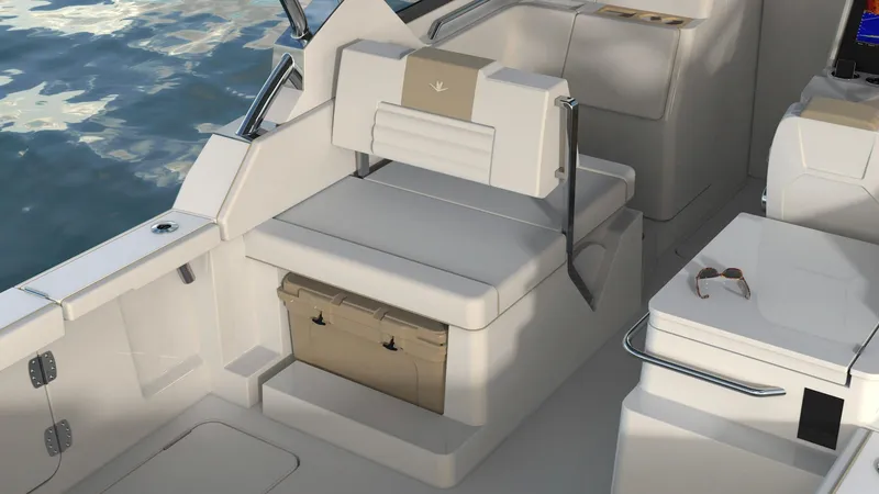 Slide: The Image of 2023 Bertram 28XC boat interior with cushioned seating and storage. - 7