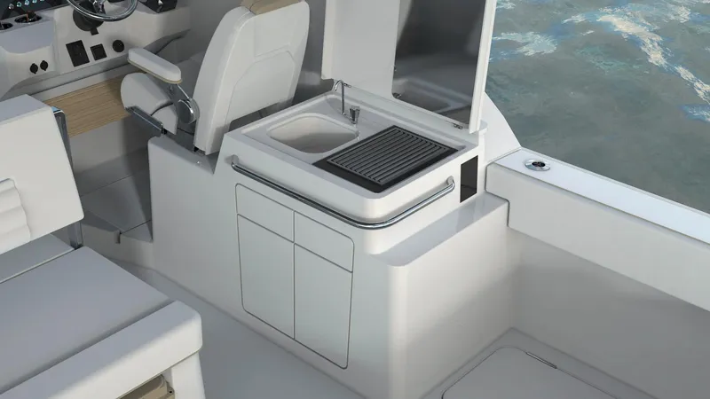 Slide: The Image of Interior of 2023 Bertram 28XC boat with sink and grill station. - 8