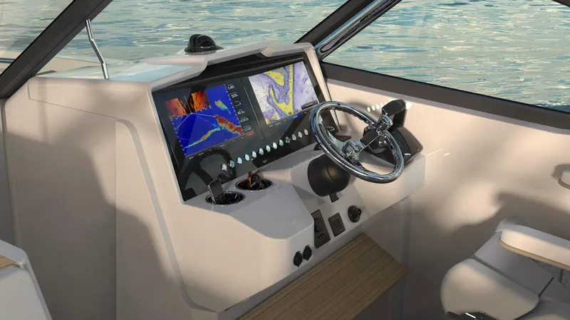 Slide: The Image of Modern helm of 2023 Bertram 28XC boat with advanced navigation system. - 9