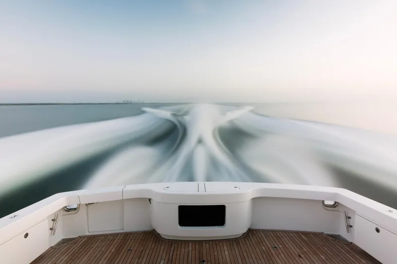 Slide: The Image of 2023 Bertram 61 Convertible yacht cruising, view from deck. - 10