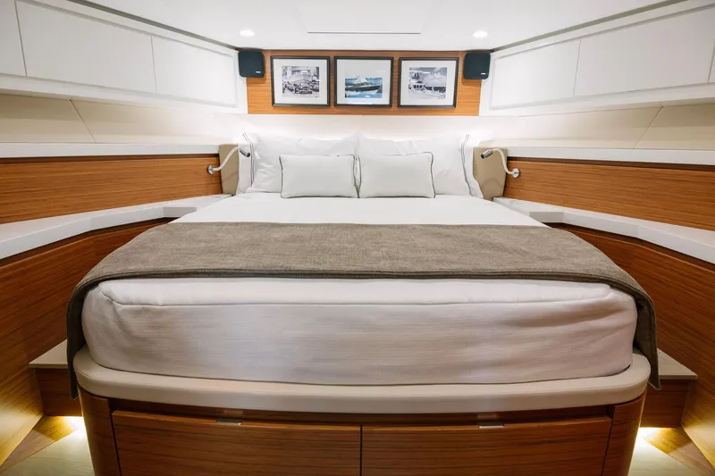 Slide: The Image of Luxurious bedroom interior of 2023 Bertram 61 Convertible yacht with modern design. - 25