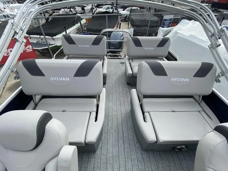 Slide: The Image of 2023 Sylvan L3 RLZ pontoon boat with spacious seating and modern design. - 4