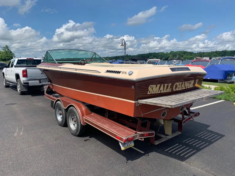 Slide: The Image of 2005 Coronado Custom boat named Small Change on a trailer in a parking lot. - 3