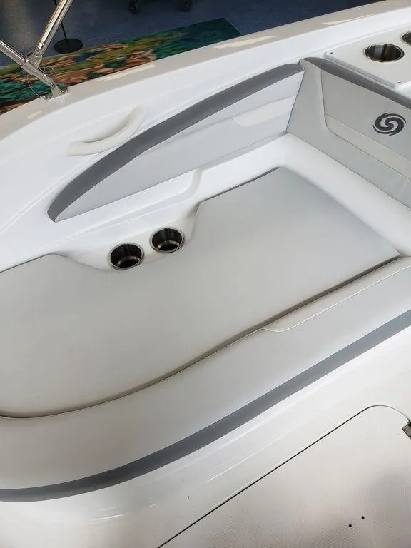 Slide: The Image of 2022 Hurricane SunDeck Sport 205 OB boat interior seating area. - 4