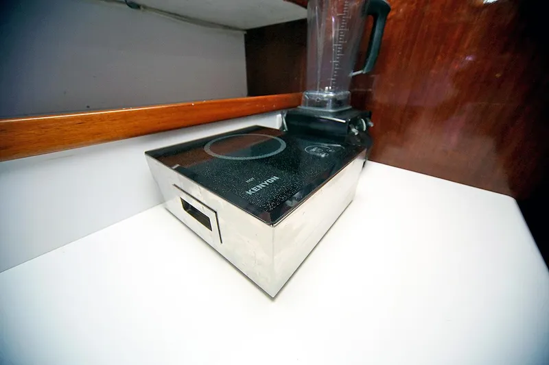 Slide: The Image of Blender on the counter of a 1971 Hatteras 45 Convertible yacht kitchen. - 21