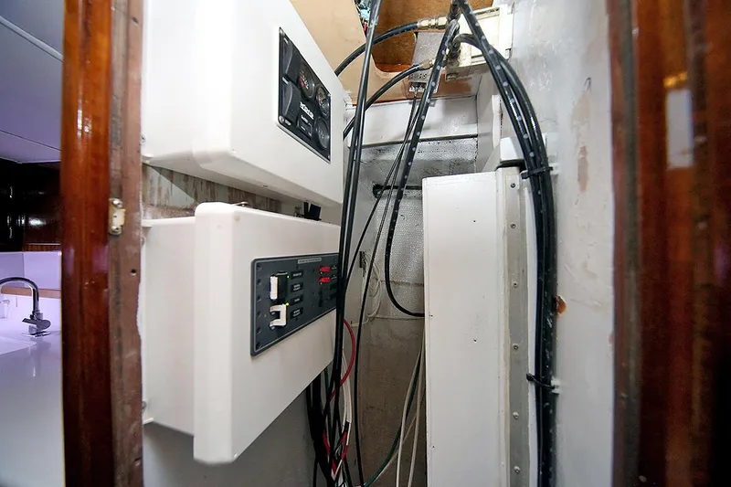 Slide: The Image of Electrical panel and wiring inside a 1971 Hatteras 45 Convertible yacht. - 34