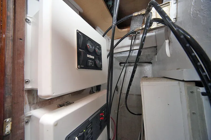 Slide: The Image of Electrical panel and wiring inside a 1971 Hatteras 45 Convertible boat. - 35