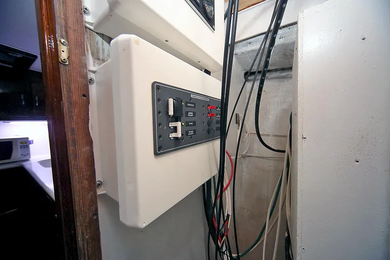 Slide: The Image of Electrical panel inside a 1971 Hatteras 45 Convertible boat. - 36