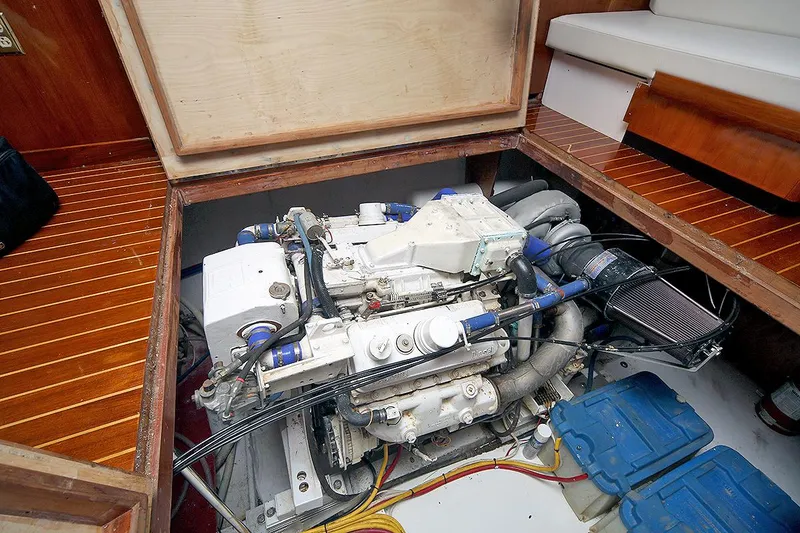 Slide: The Image of 1971 Hatteras 45 Convertible engine compartment with visible engine and components. - 41