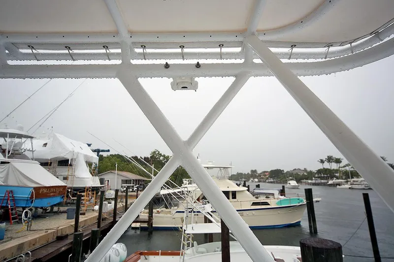Slide: The Image of 1971 Hatteras 45 Convertible at a marina, view from the deck. - 48