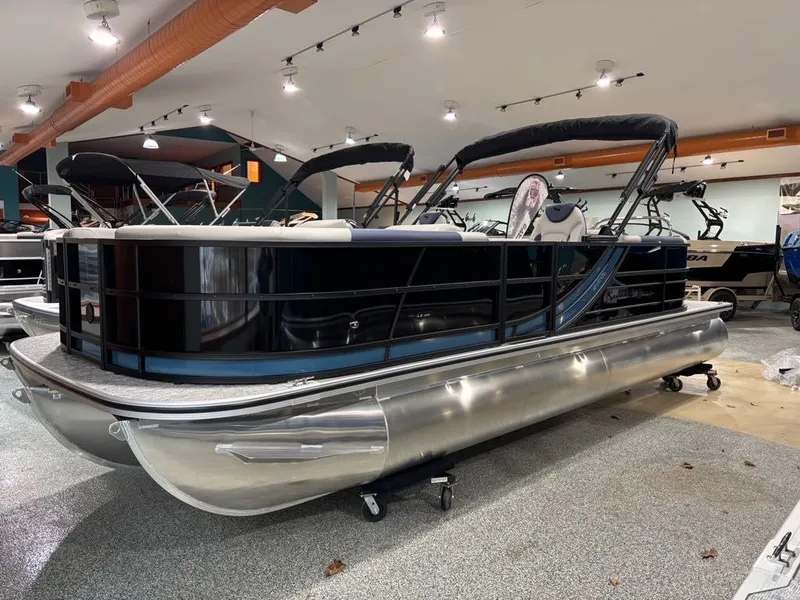 The Image of 2026 South Bay 200 Series S224RS pontoon boat in showroom. - 1