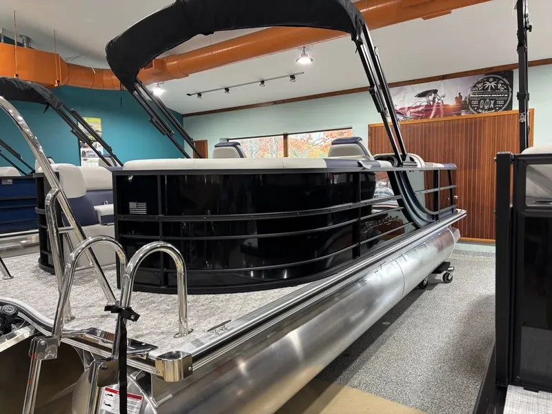 Slide: The Image of 2026 South Bay 200 Series S224RS pontoon boat in showroom. - 3