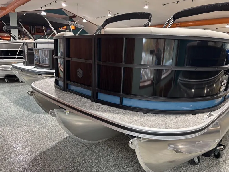 Slide: The Image of 2026 South Bay 200 Series S224RS pontoon boat in showroom. - 9
