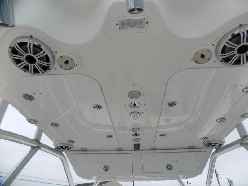 Slide: The Image of 2017 Sea Fox 256 Voyager boat ceiling with speakers and lights. - 6