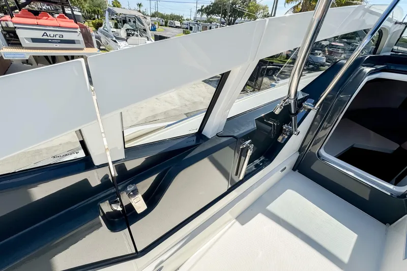 Slide: The Image of Interior view of a 2021 Fairline F Line 33 yacht, showcasing sleek design and modern features. - 13