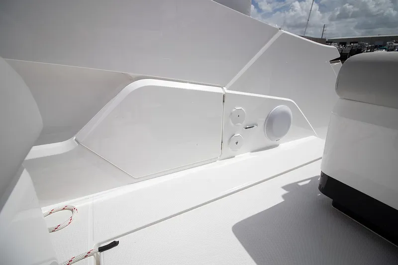 Slide: The Image of 2021 Fairline F Line 33 yacht deck with storage compartment and speaker. - 25