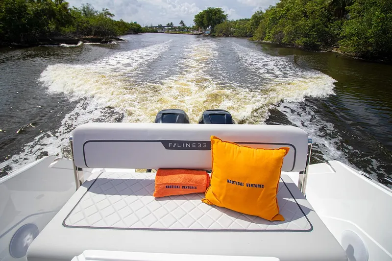 Slide: The Image of Fairline F Line 33 (2021) cruising on a river, view from the back seat. - 28