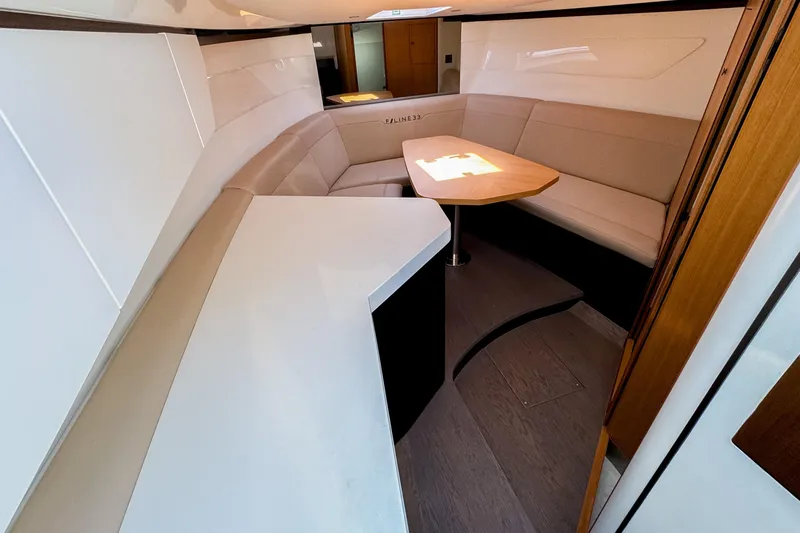Slide: The Image of Interior of 2021 Fairline F Line 33 yacht with modern seating and table. - 31