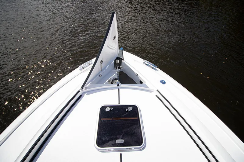 Slide: The Image of 2021 Fairline F Line 33 boat bow on water. - 34