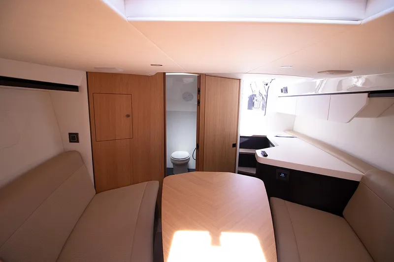 Slide: The Image of Interior of 2021 Fairline F Line 33 yacht with seating and bathroom. - 41
