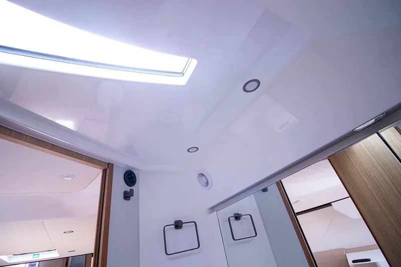 Slide: The Image of Interior ceiling of 2021 Fairline F Line 33 yacht with modern lighting. - 46