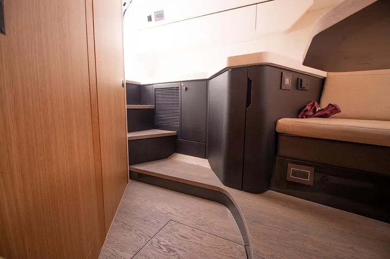 Slide: The Image of Interior of 2021 Fairline F Line 33 yacht with modern wooden and black finishes. - 49