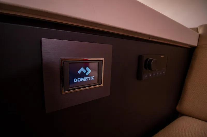 Slide: The Image of Control panel on the 2021 Fairline F Line 33 yacht featuring Dometic display. - 53