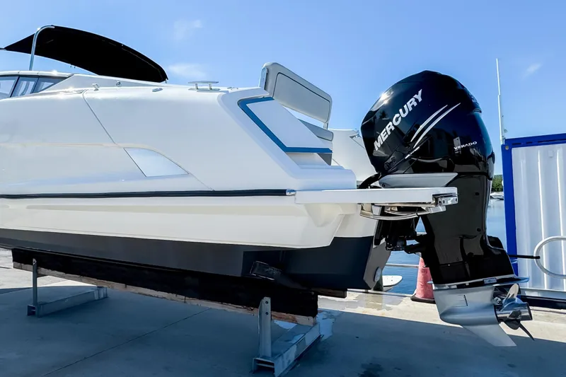 Slide: The Image of 2021 Fairline F Line 33 boat with Mercury Verado engine on display. - 6