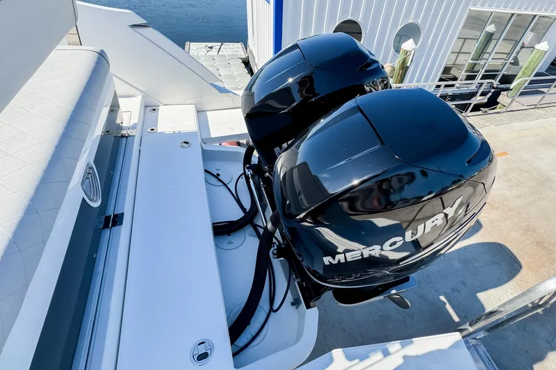 Slide: The Image of 2021 Fairline F Line 33 boat with dual Mercury outboard engines at dockside. - 7