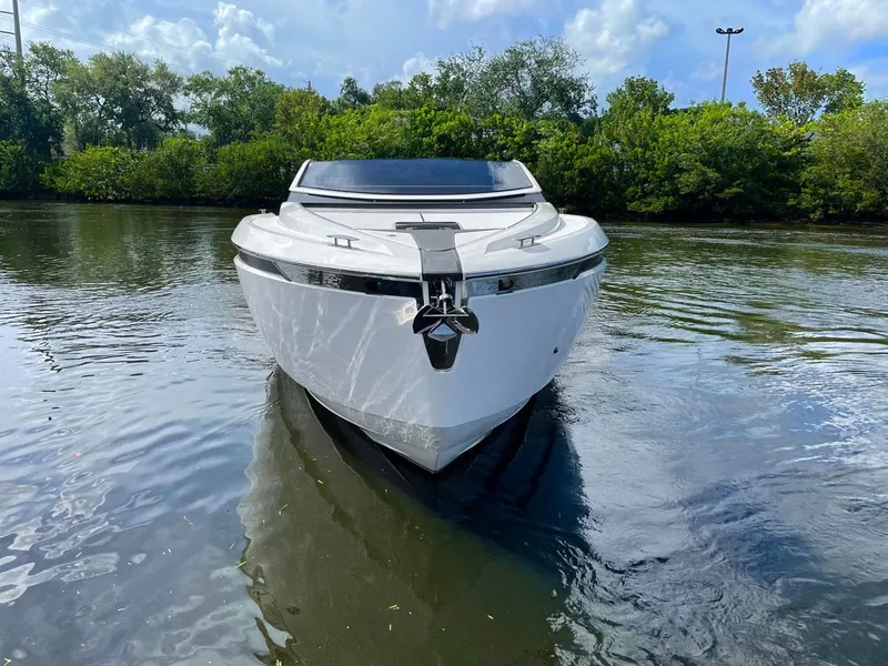 The Image of 2021 Fairline F Line 33 luxury yacht on calm water. - 9