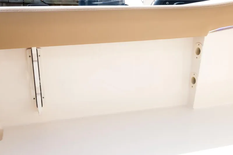 Slide: The Image of 2023 Scout 240 XSF boat interior detail with beige and white finish. - 19