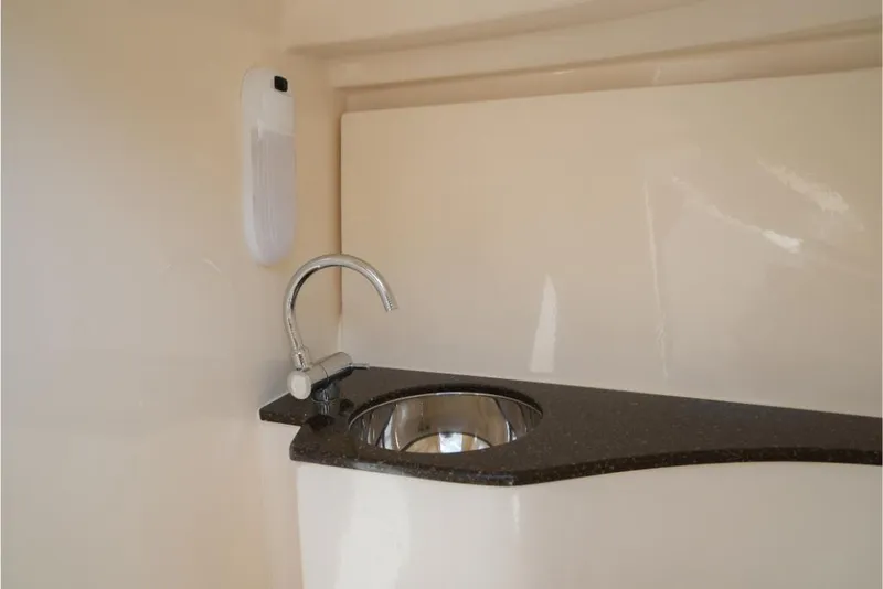Slide: The Image of 2023 Scout 240 Dorado boat interior sink and faucet - 46