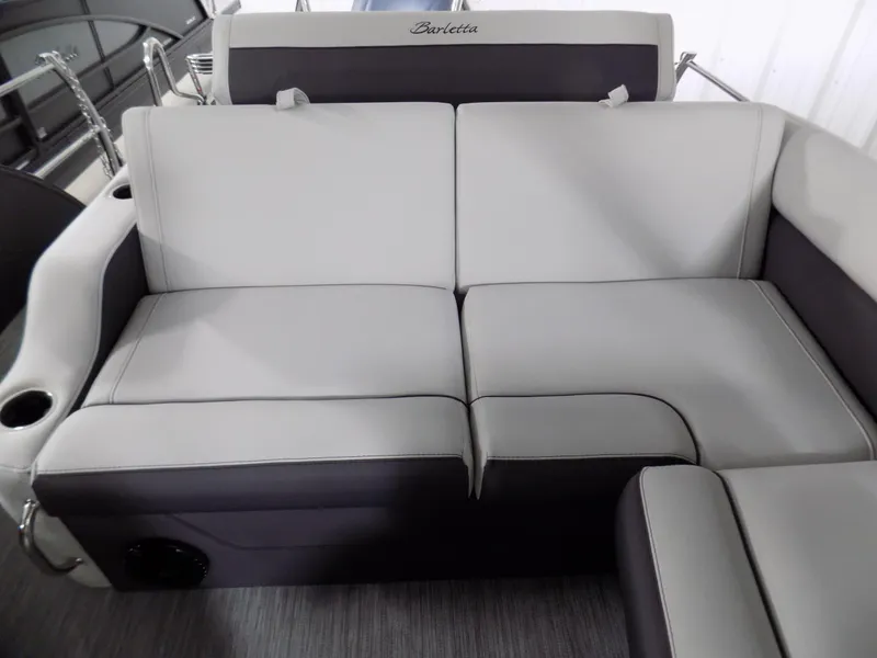 Slide: The Image of 2023 Barletta Corsa 23U boat interior with plush seating and modern design. - 16