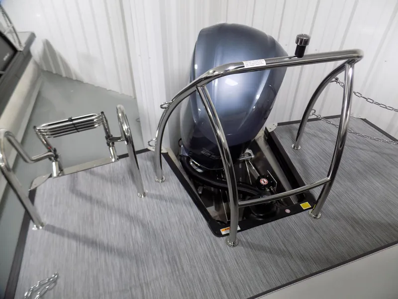 Slide: The Image of 2023 Barletta Corsa 23U boat engine with stainless steel railing and ladder. - 18