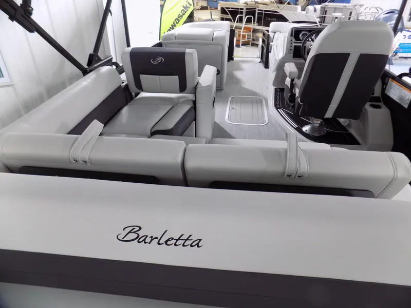 Slide: The Image of 2023 Barletta Corsa 23U boat interior with luxurious seating and modern design. - 20