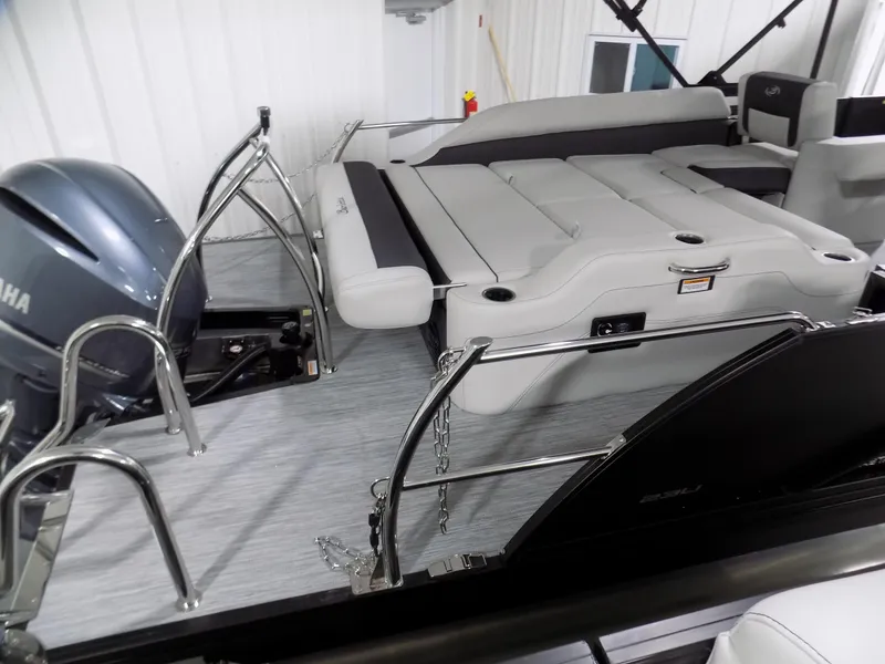 Slide: The Image of 2023 Barletta Corsa 23U pontoon boat interior with Yamaha engine, featuring sleek seating and modern design. - 3