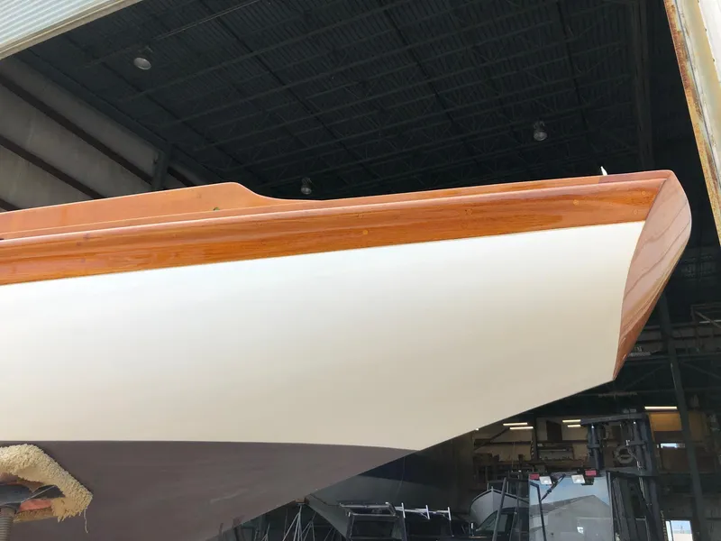 Slide: The Image of Herreshoff S Class 1919 sailboat bow in a boatyard. - 3