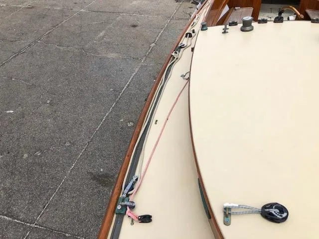 Slide: The Image of Close-up of 1919 Herreshoff S Class sailboat deck and rigging. - 8