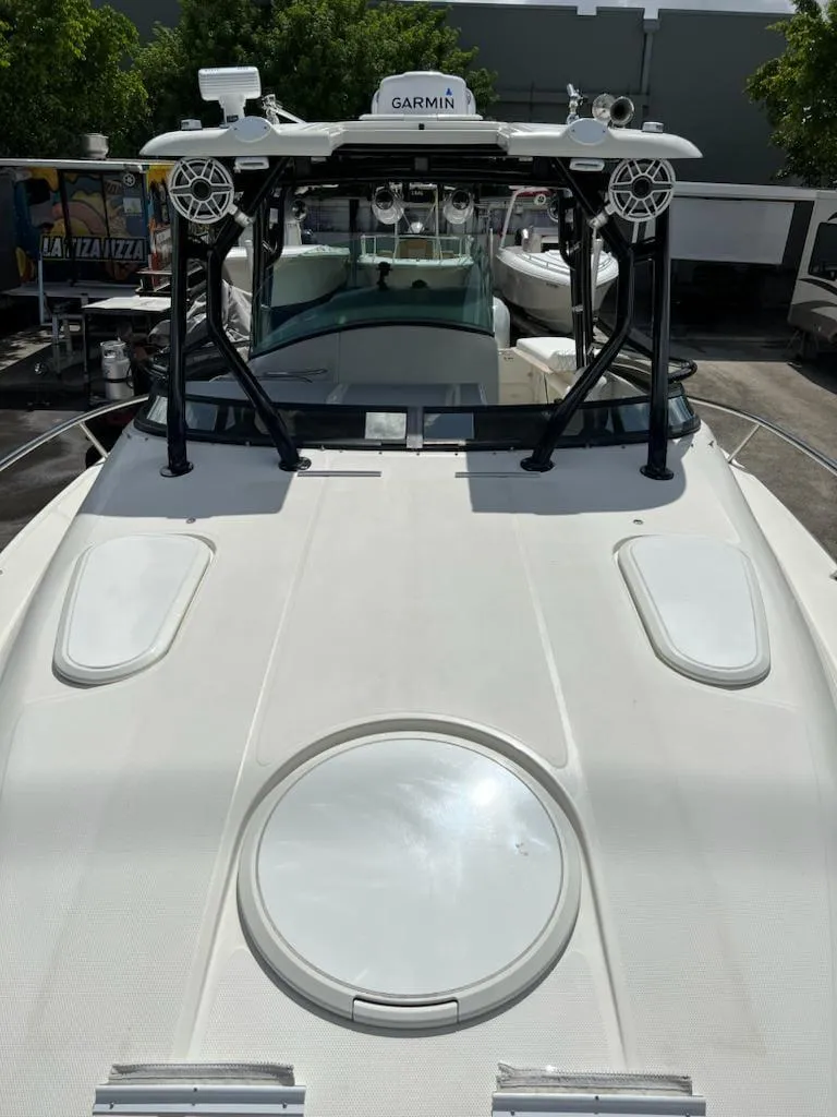 Slide: The Image of 2005 Hydra-Sports 3300 VX boat with Garmin navigation system. - 16