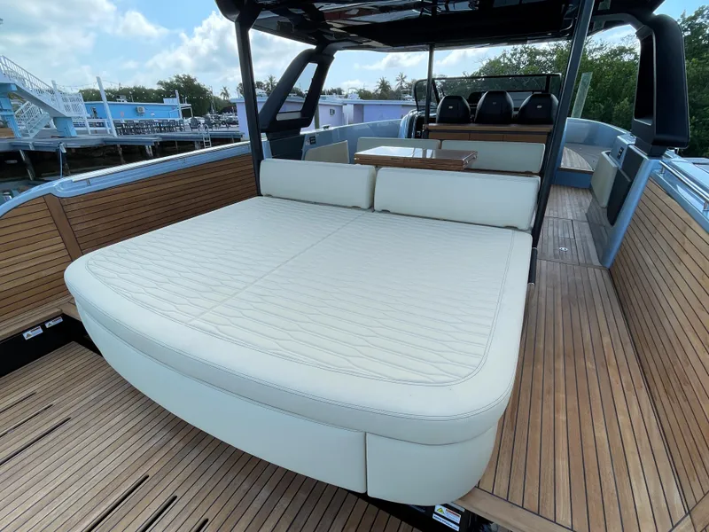 Slide: The Image of 2023 Cranchi A46 yacht with spacious deck and luxurious seating. - 25