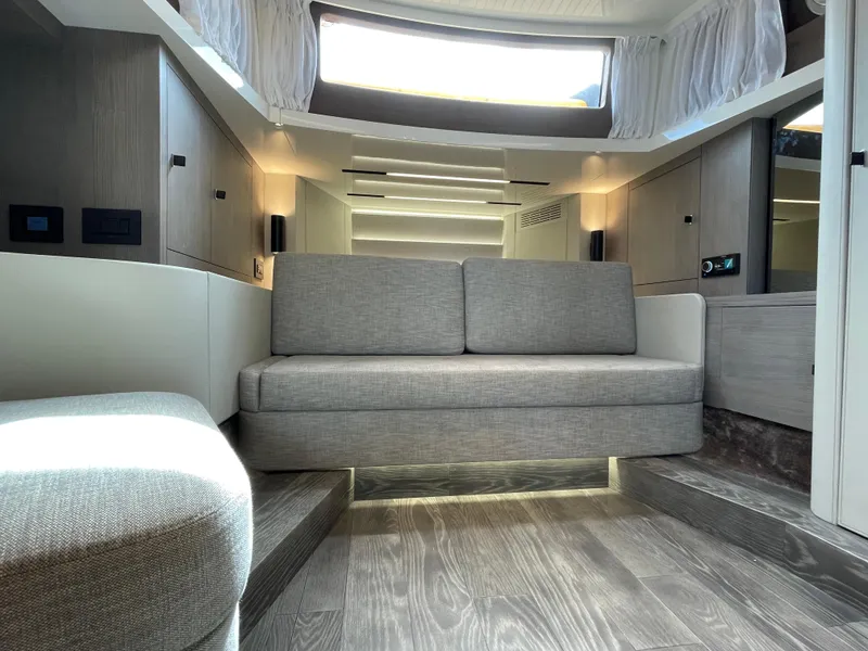 Slide: The Image of Modern interior of 2024 Cranchi A46 yacht with sleek design and comfortable seating. - 38