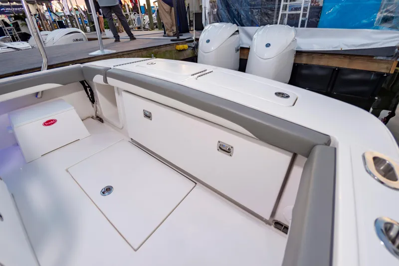 Slide: The Image of 2025 Regulator 23 boat interior with seating and storage compartments. - 30