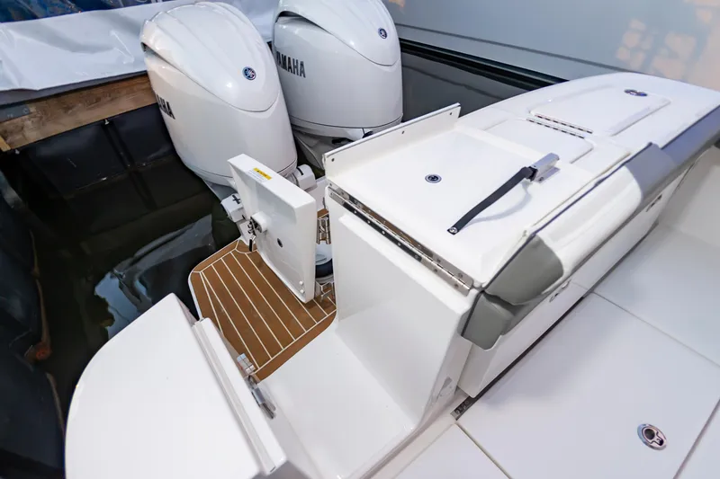 Slide: The Image of 2025 Regulator 23 boat with dual Yamaha engines and sleek deck design. - 33